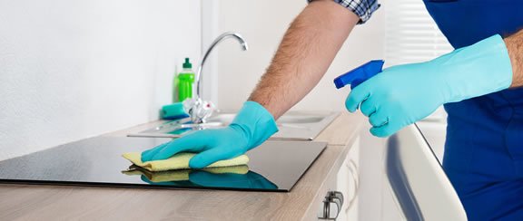 Man cleaning a rental property